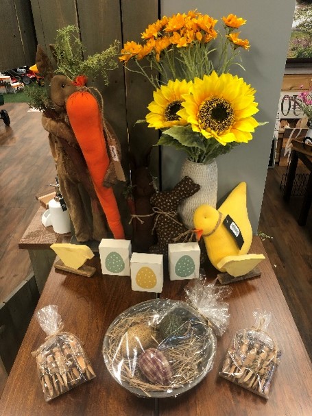sunflowers and easter themed products on a table